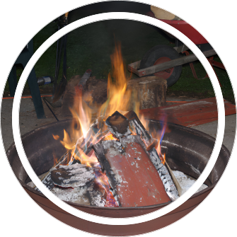 Roaring campfire at Grandpa's Farm Campground
