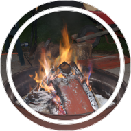 Roaring campfire at Grandpa's Farm Campground